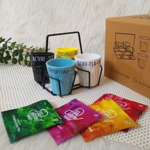 "Cutting-tea box"-four different colours unbreakable cutting chai tea cups along with stand( personalisation possible),four tea sachets ,a greeting card For Festive gift