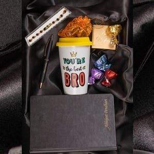 You Are The Best Bro Rakhi hamper  Includes Rudraksha Rakhi,Ceramic Tumbler,Personalized Diary,Personalized Pen,Chocolate Pouch & Best wishes Card a personal touch to the gift hamper