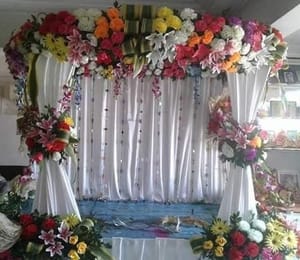 Artificial Flower Decoration With White Background For Ganesh Chaturthi Flower Decoration - Ideas for Ganpati Festival Decoration Service For Home 2023