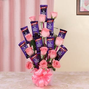 Glass Vase Arrangement Of 12 Pink Roses And 10 Dairy Milk Chocolates (13Gms Each) For Mother's Day Gift For Mom