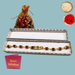 Double Trouble Rakhi hamper  Includes Rudraksha Rakhi,Ceramic Tumbler,Tote Bag,Fridge Magnet,Chocolate Pouch & Best wishes Card a personal touch to the gift hamper.