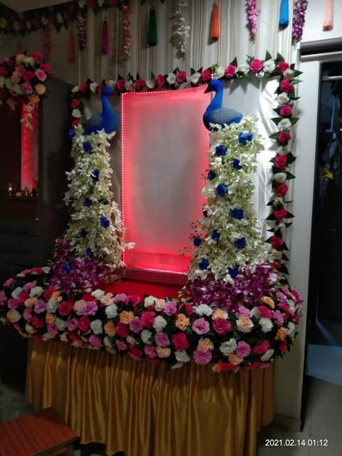 Artificial Flower Decoration With Peacock Design For Ganesh Chaturthi Flower Decoration - Ideas for Ganpati Festival Decoration Service For Home