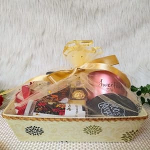 "Rakhi Basket For Sister"-Rose gold coffee mug(customization available),black coaster,Dark chocolate,Ferraro rocher,Fragrance bar,Carnival mix dry fruits For Festive gift