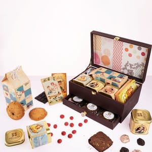 Treasure Box of Premium collection (3 chocolate bars,1 tin of Pan nuts,Stuff dates,Almond rocks,1 box baklava (6 peices),4 Brownies,1 Florentine,2 Chikkies)
