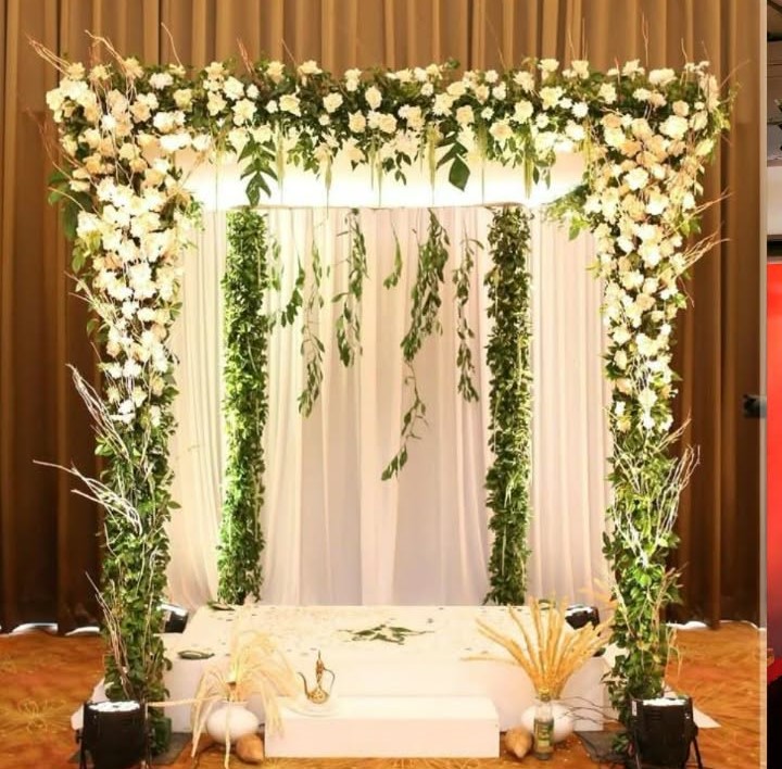 Elegant White Floral & Greenery Ganpati Setup